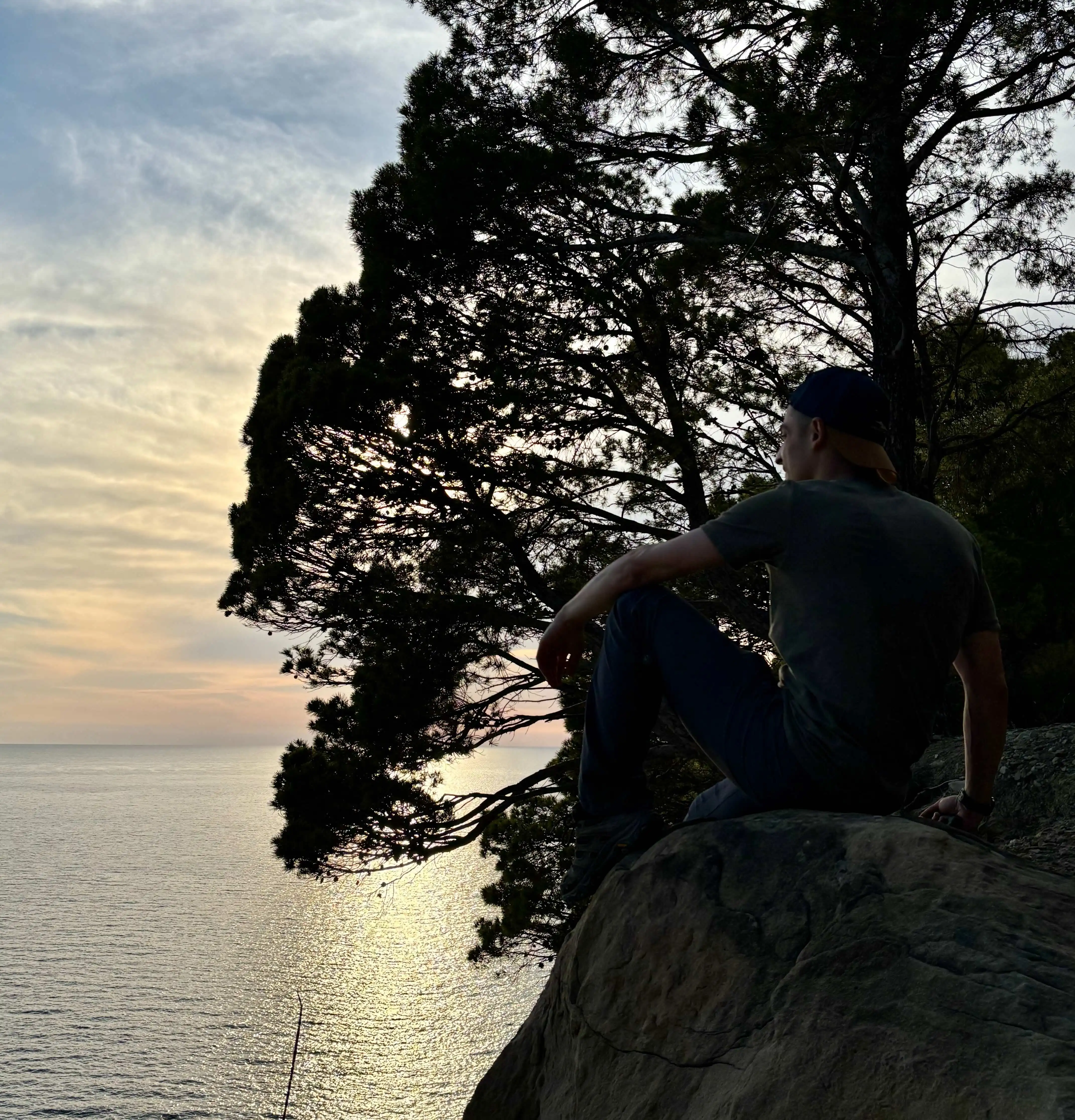 Io seduto su una roccia